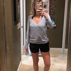 Long sleeve grey shirt.